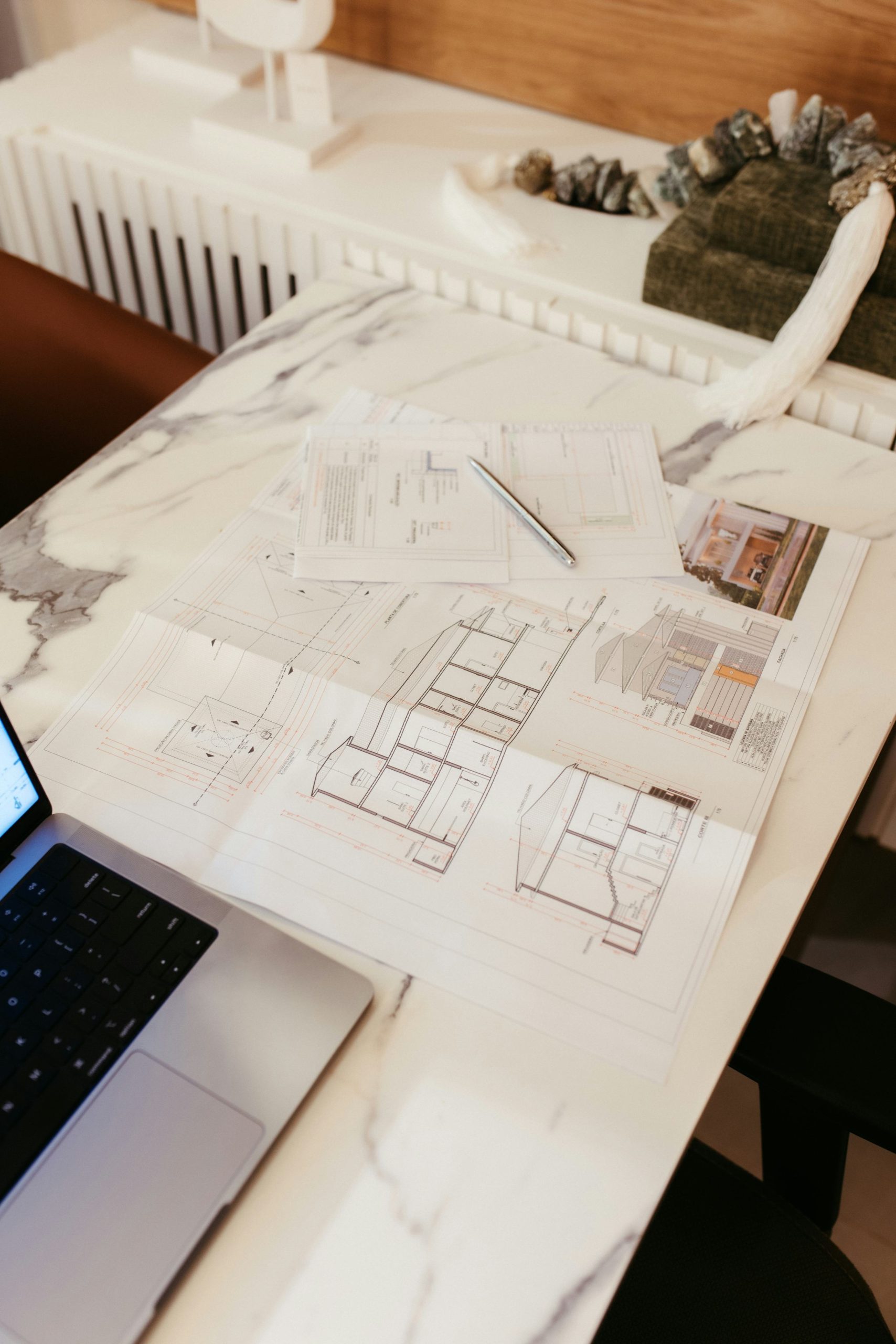 Architectural plans representing capital, finance and project execution